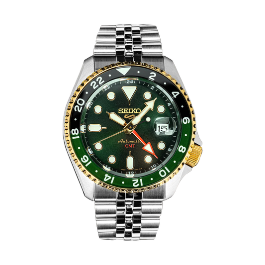 Seiko watch with green dial and silver metal strap on a white background