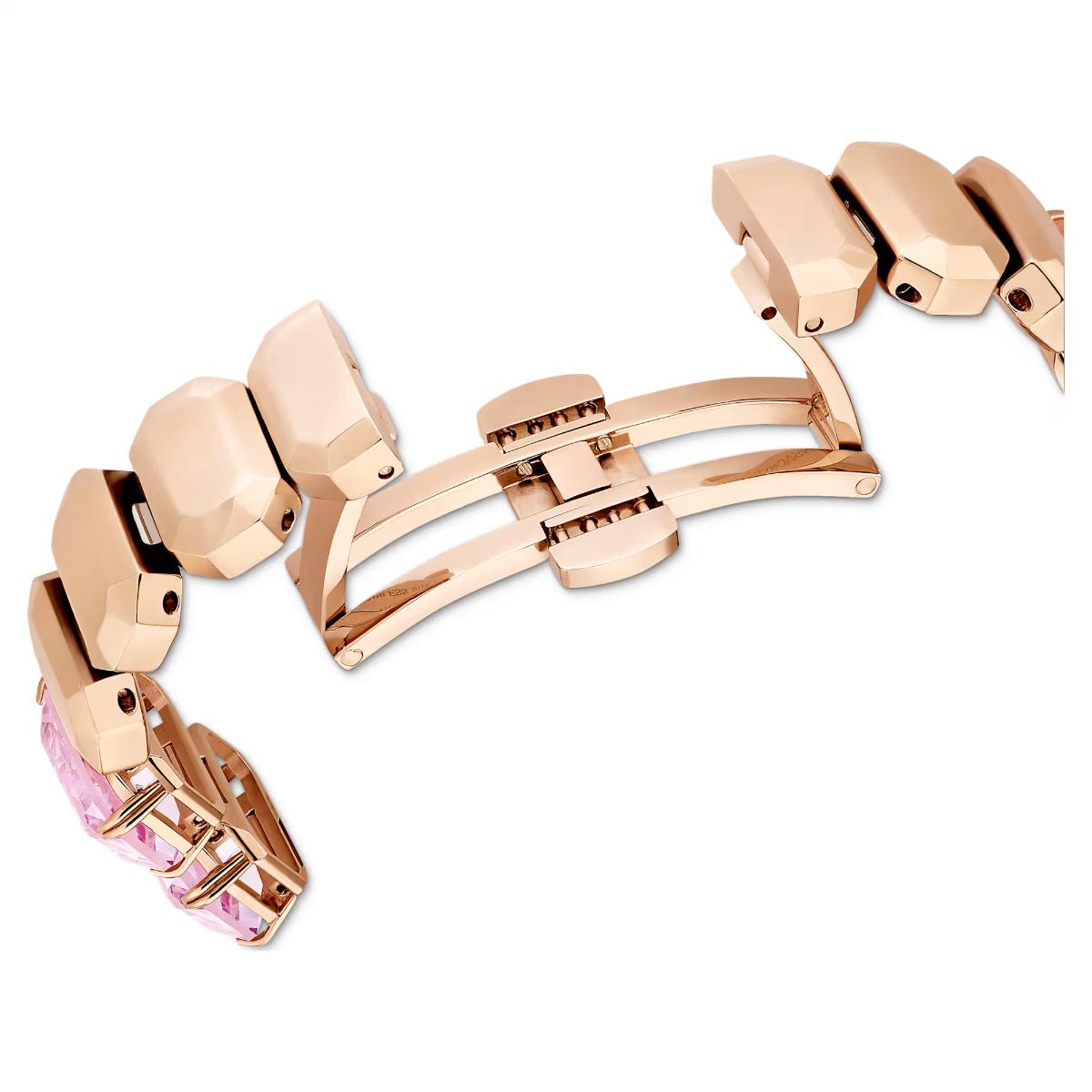 Rose gold bracelet with pink gemstones on a white background