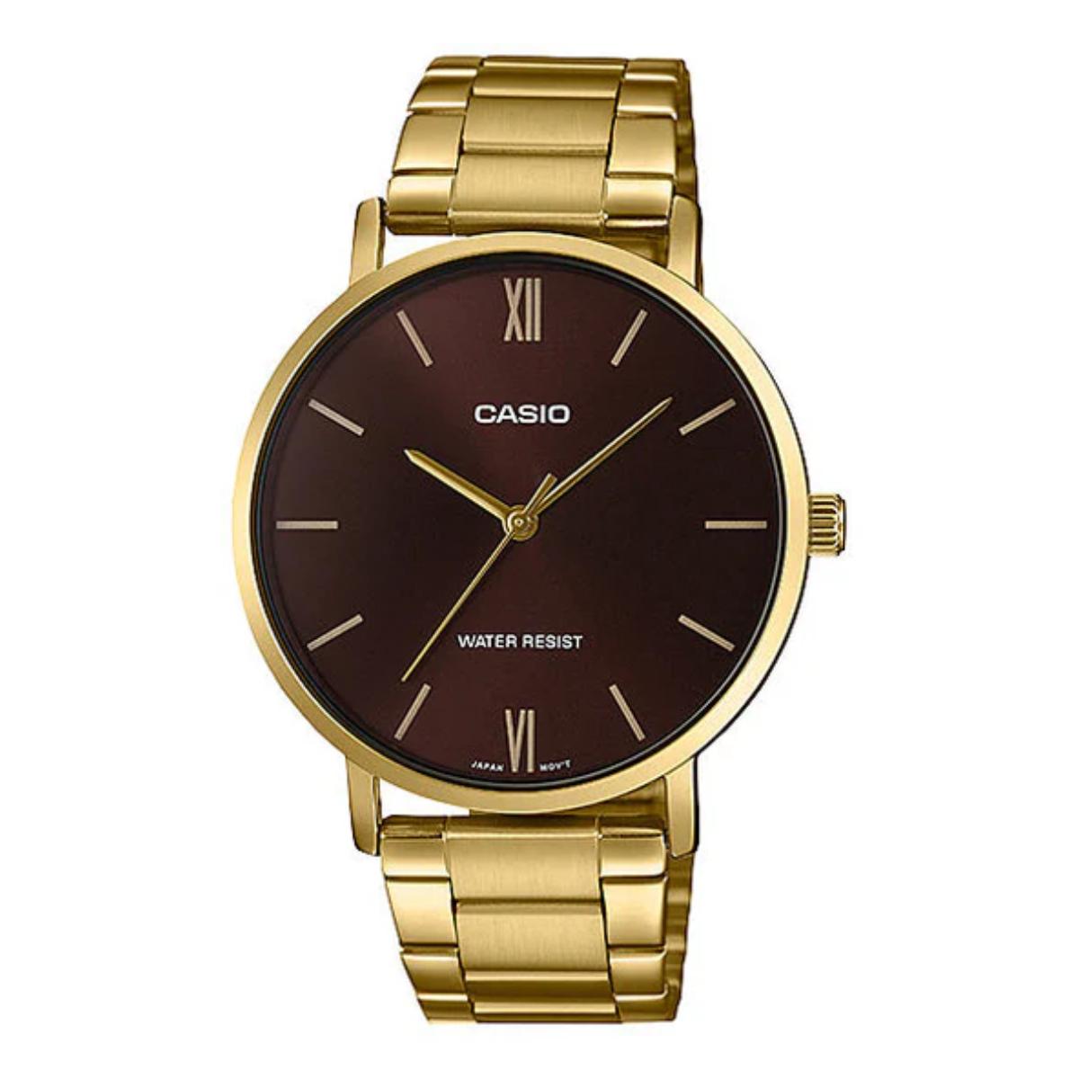 Gold Casio watch with a brown dial on a white background
