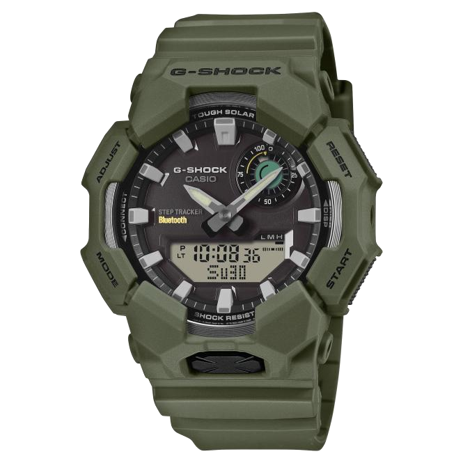 Green G-Shock watch with digital and analog display on a white background