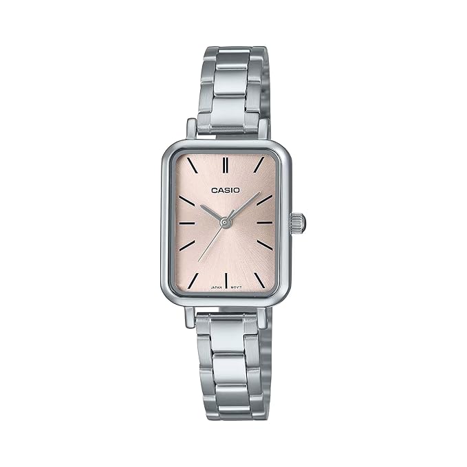 Casio watch with silver strap and pinkish-beige dial on a white background