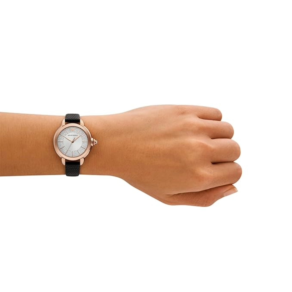 Hand wearing a watch with a white face and rose gold case on a white background
