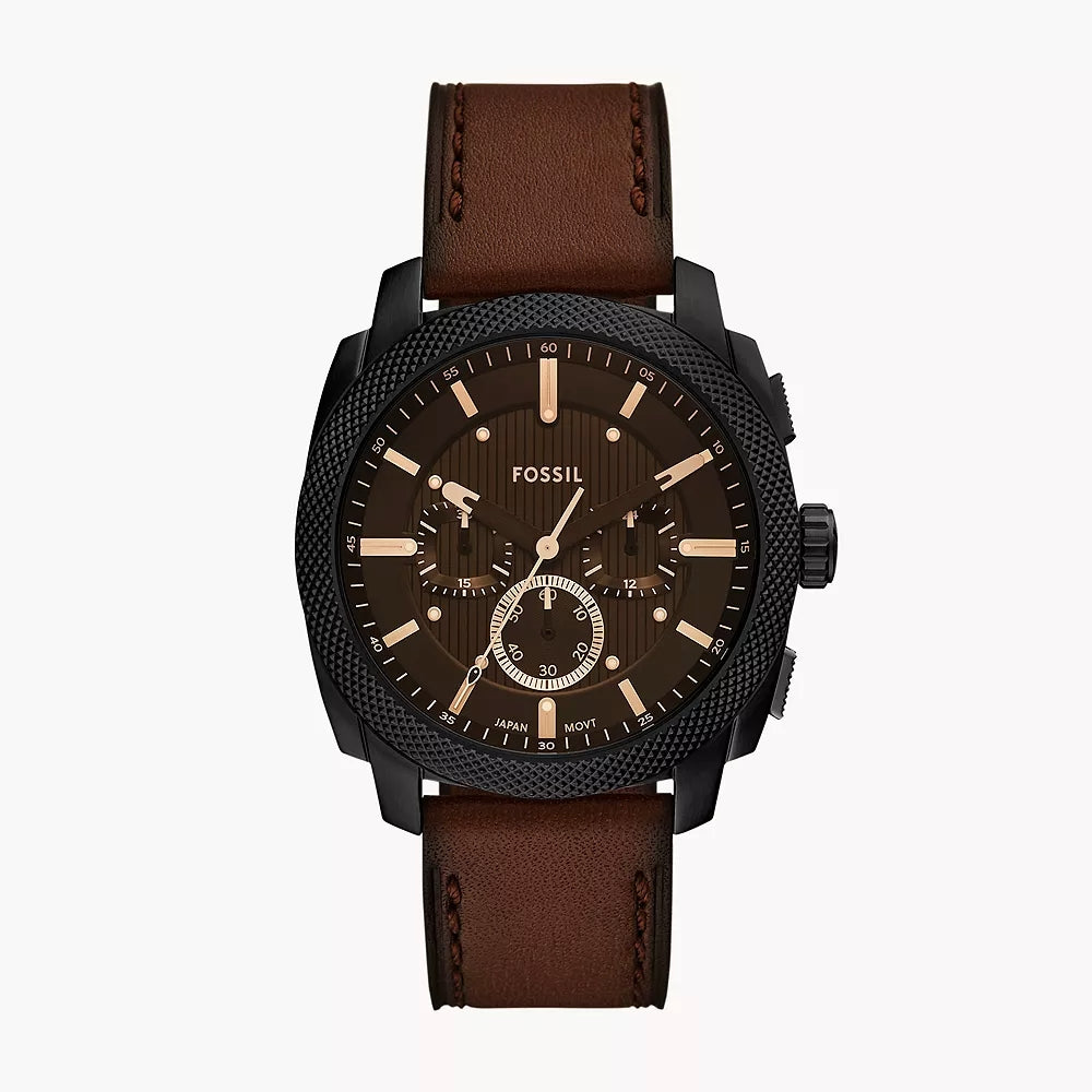 Fossil watch with brown leather strap on a white background