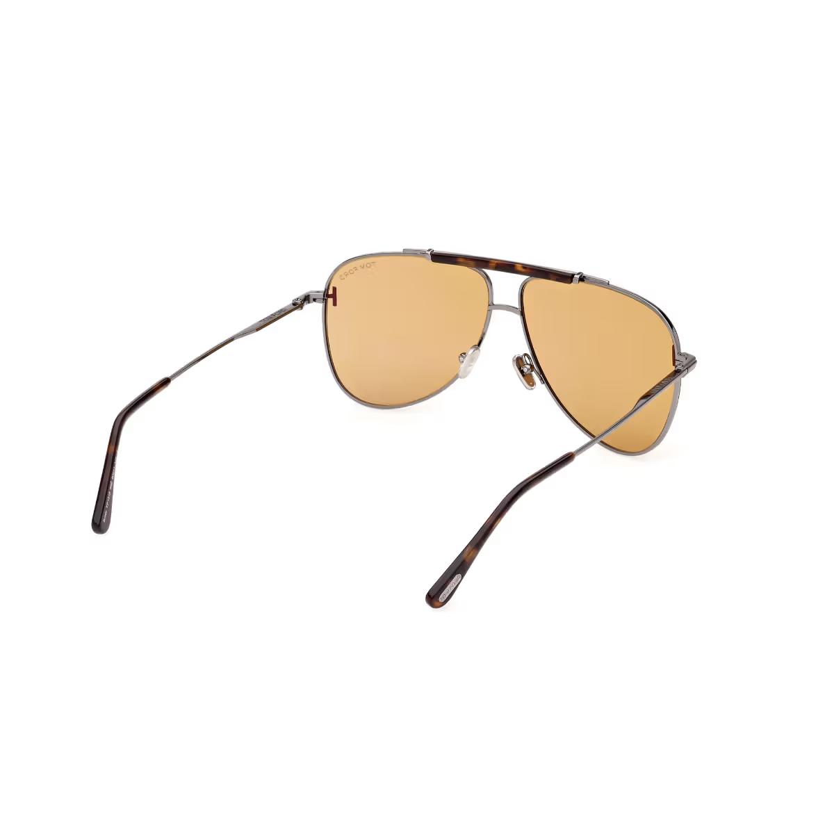 Aviator sunglasses with gold lenses on a white background