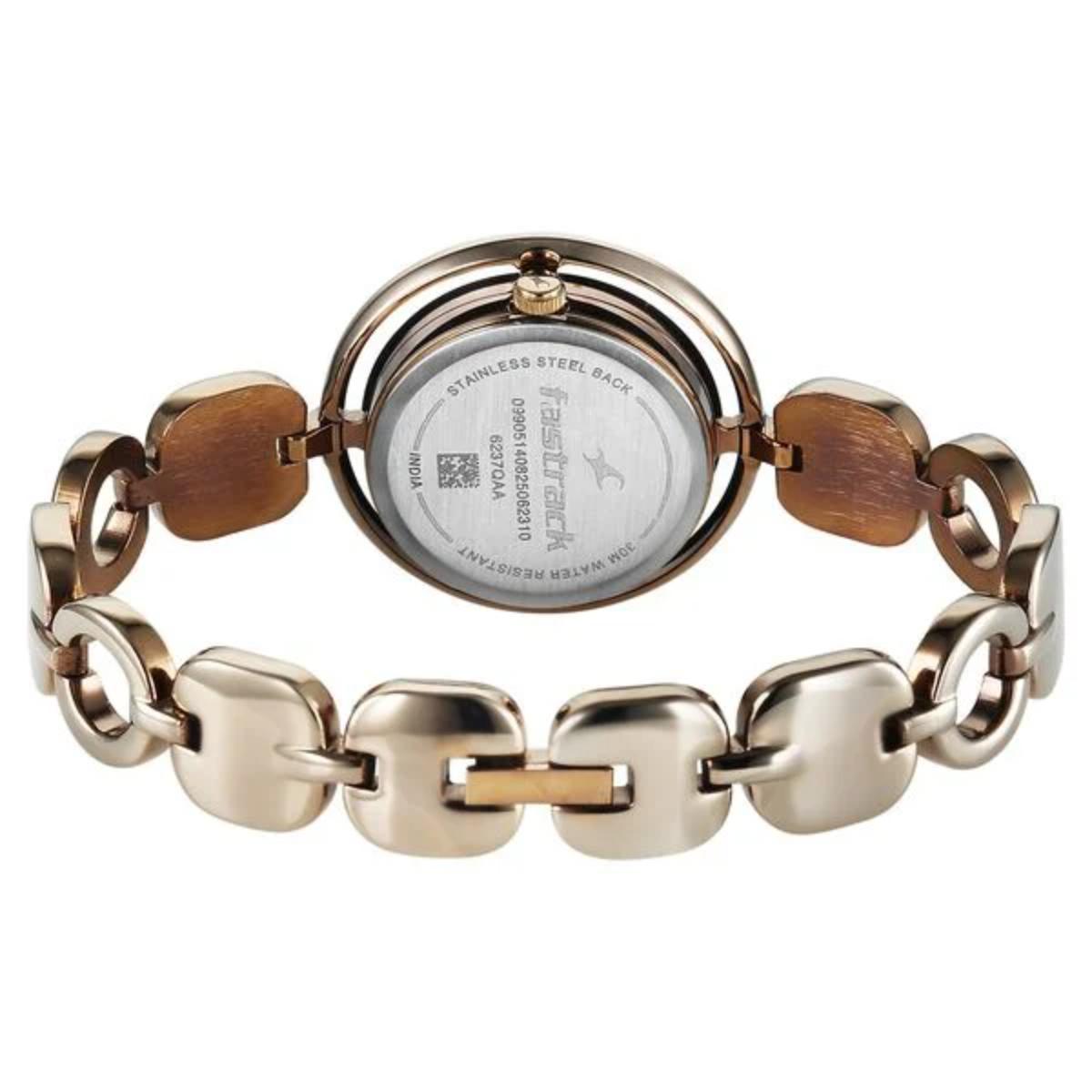 Gold and silver chain-link watch on a white background