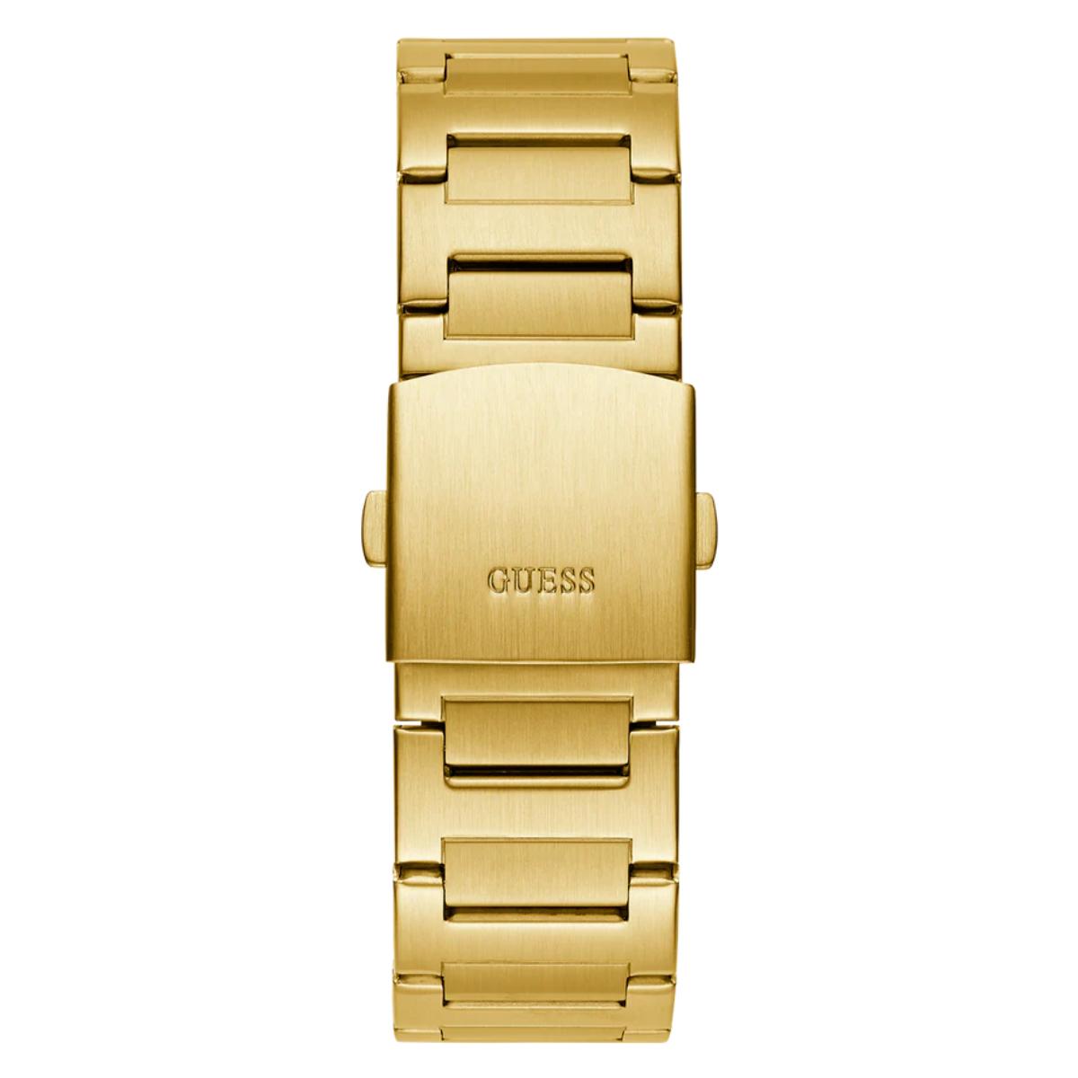 Gold watch with 'GUESS' branding on a white background