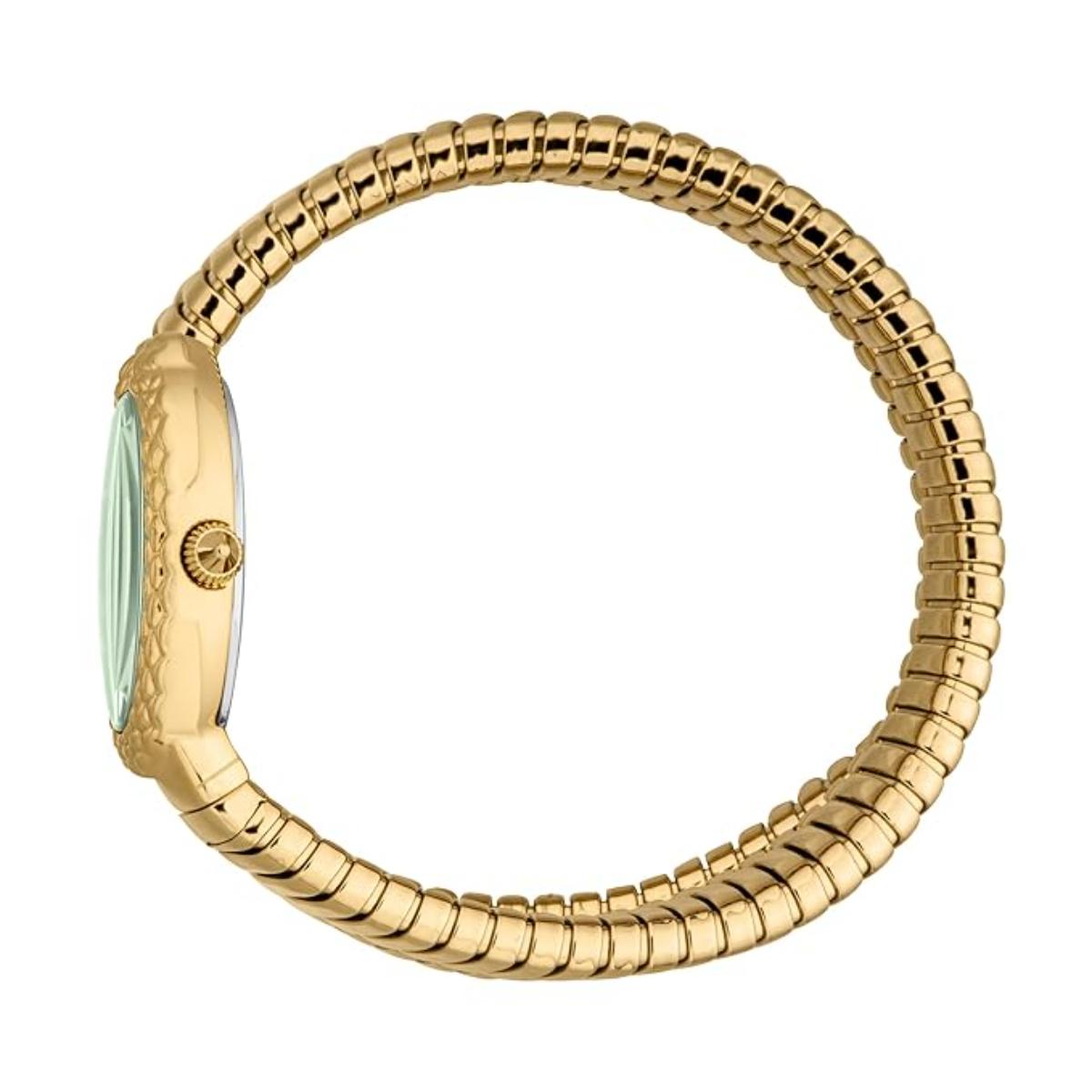Gold ring with a green gemstone on a white background