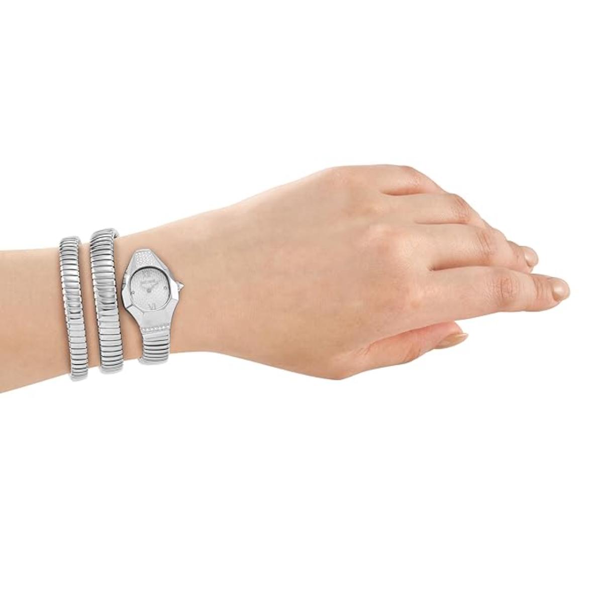 Hand wearing a silver watch and bracelets on a white background