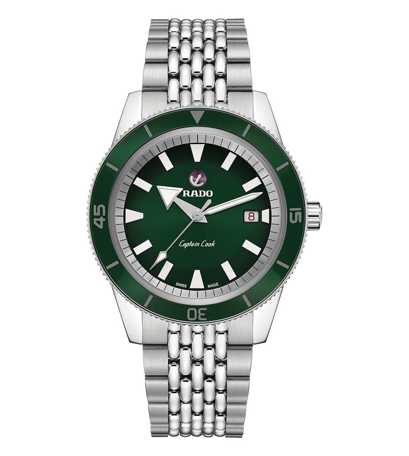 A silver Rado Captain Cook automatic watch with a green dial and date display, accompanied by a metal bracelet.