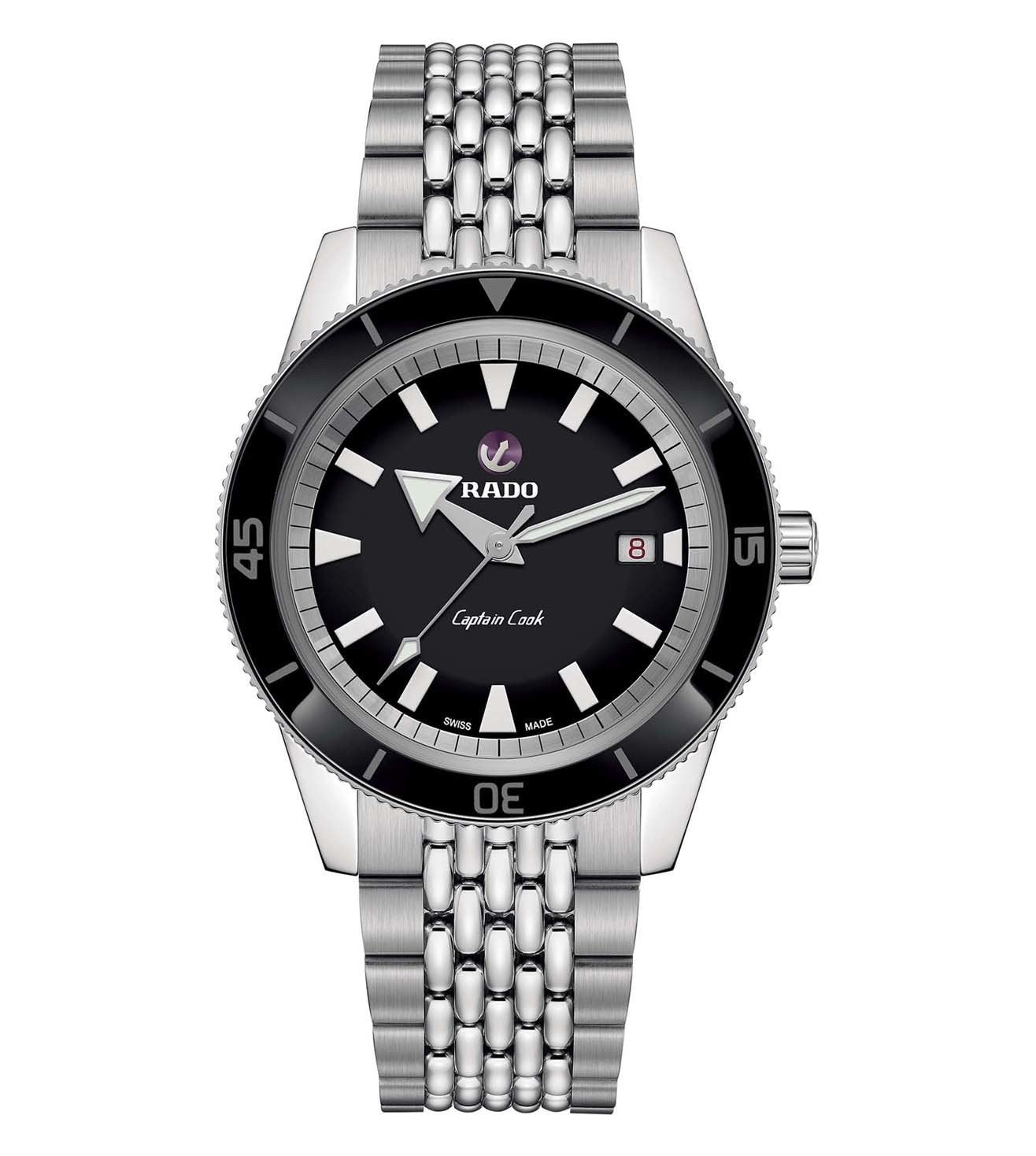 A Rado Captain Cook Automatic watch for men with a black dial, silver stainless steel bracelet, and black casing.