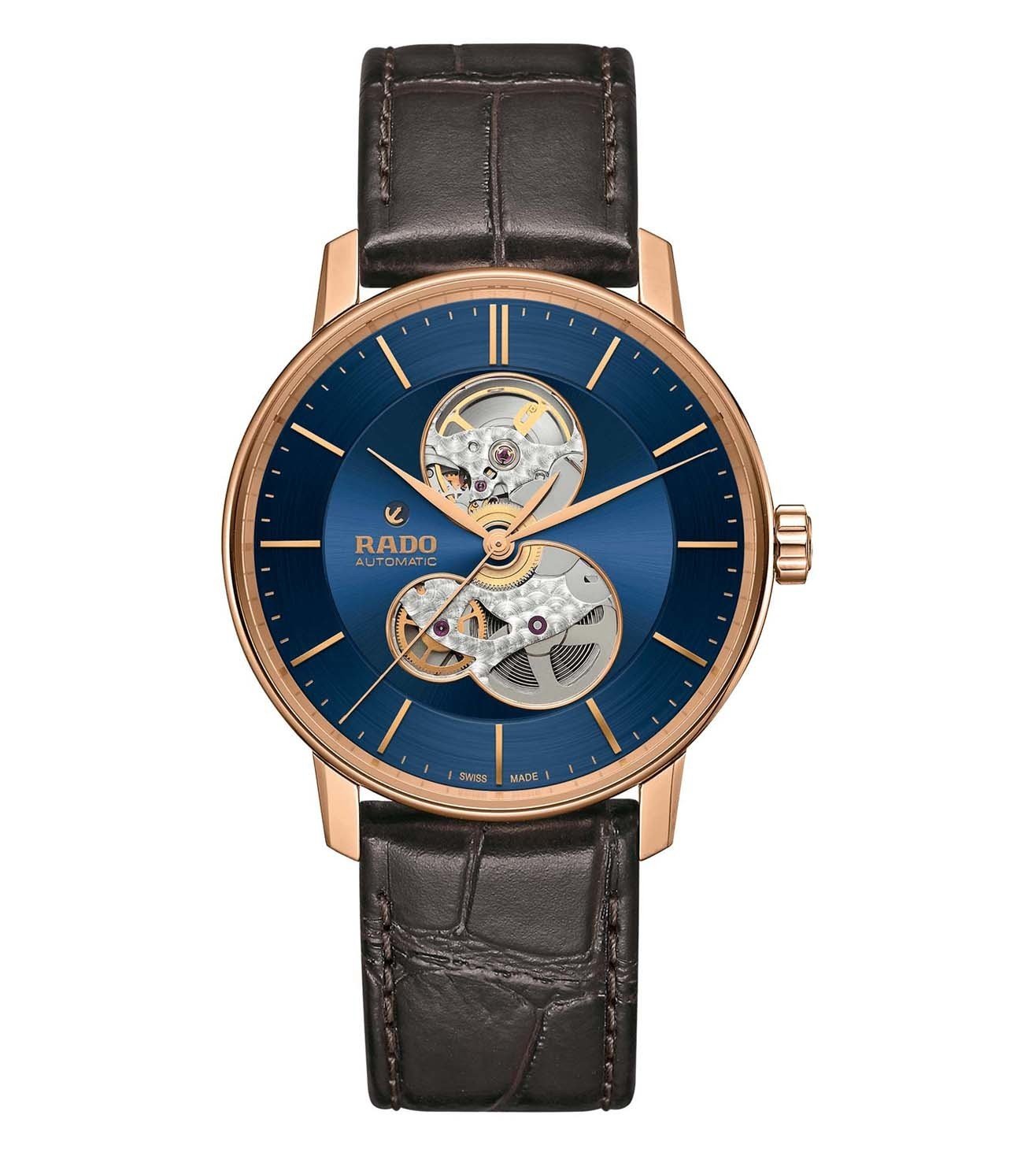 A Rado Coupole Classic Open Heart Automatic watch with a blue dial, rose gold case, and a brown leather strap.