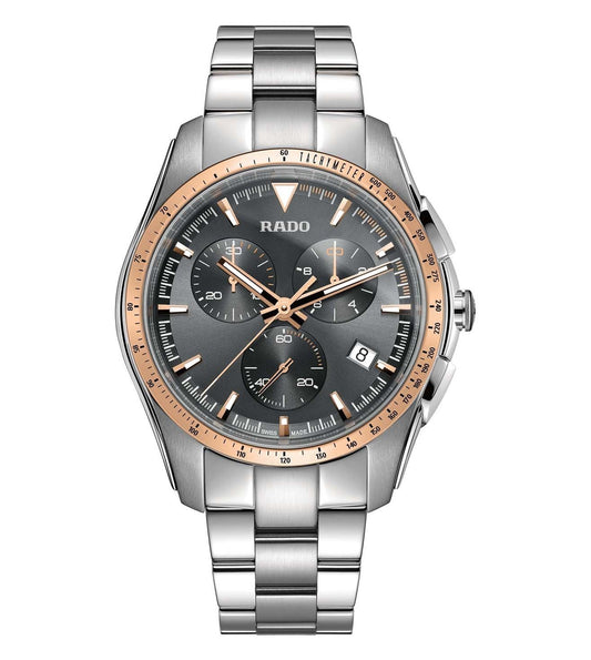 A RADO HyperChrome Chronograph watch with a silver bracelet and rose gold case, featuring a gray dial with multiple subdials and a date display.