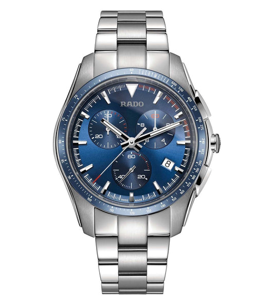 A silver RADO HyperChrome Chronograph watch with a blue dial and stainless steel bracelet.