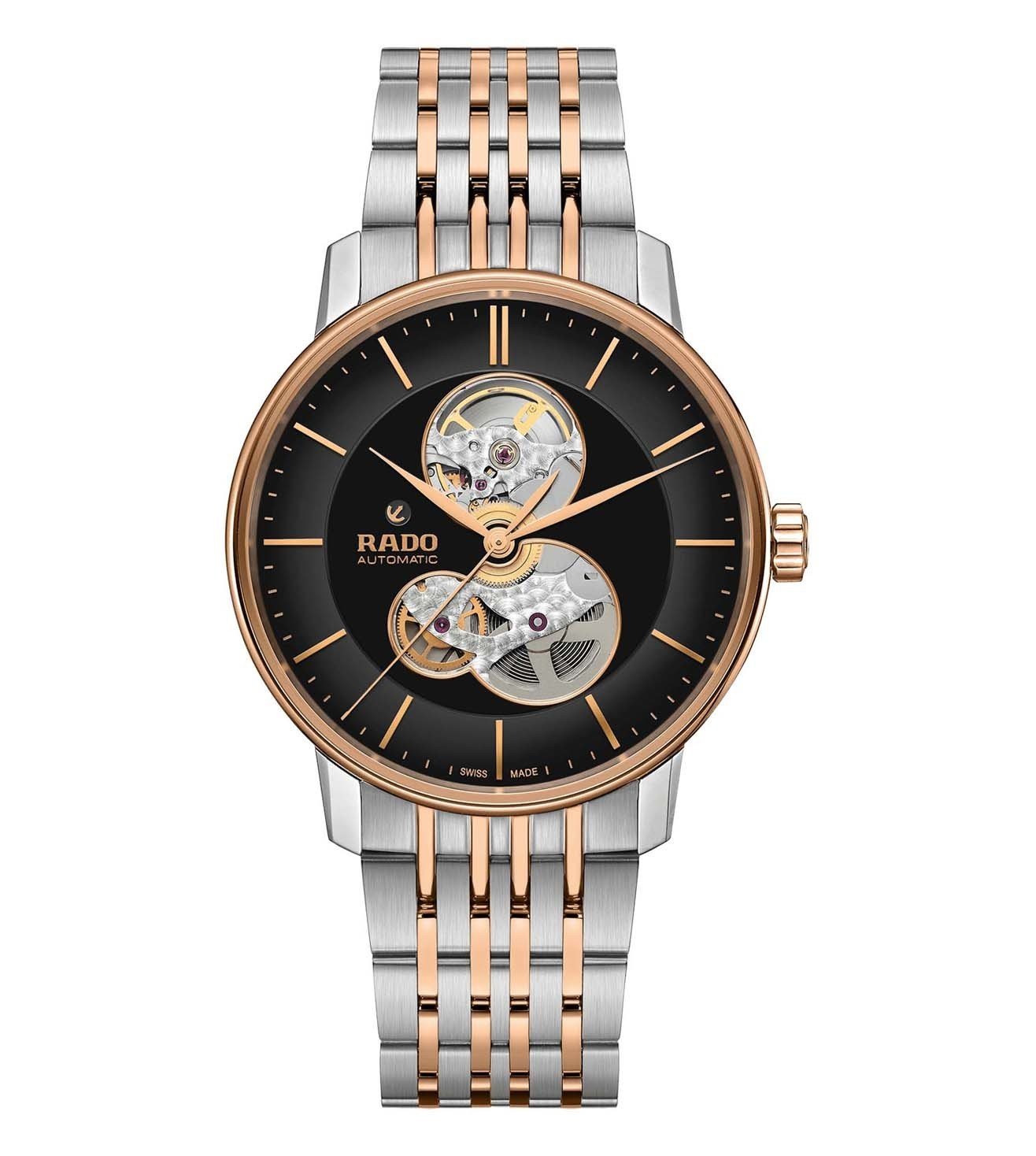 A Rado Coupole Classic Open Heart Automatic watch with a black dial, rose gold hands and markers, and a silver two-tone bracelet.