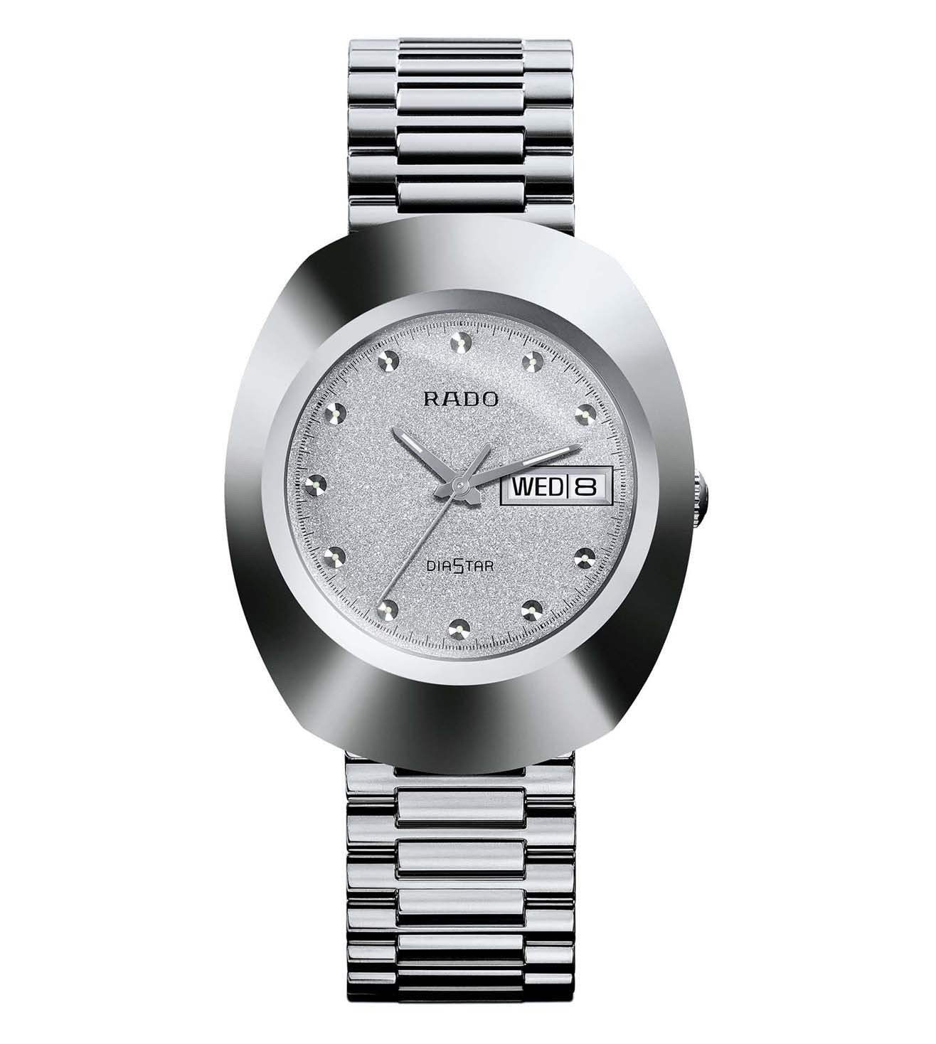 A silver Rado DiaStar Original analog watch with a textured dial and day display, featuring a stainless steel bracelet.