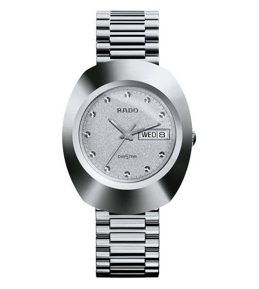 A silver Rado DiaStar Original analog watch with a textured dial and day display, featuring a stainless steel bracelet.