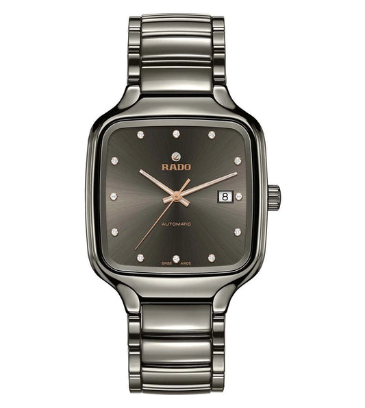 A Rado True Square Automatic Diamonds unisex watch with a square-shaped case, a dark dial, and a metallic bracelet.