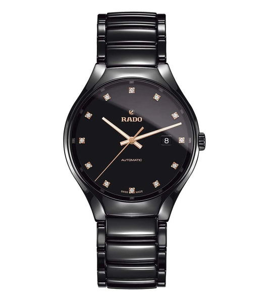 A black Rado True Automatic Diamonds unisex watch with a black bracelet and a black dial, featuring rose gold hands and diamond markers.