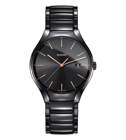 A black Rado True watch with a ceramic band and a black dial featuring rose gold markers and hands.
