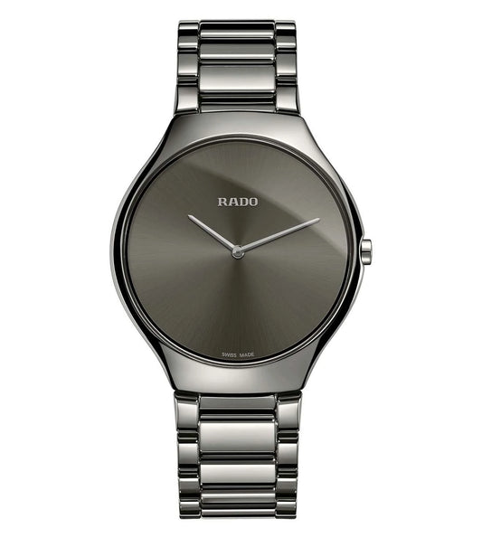A Rado True Thinline unisex watch with a silver stainless steel bracelet and a silver dial.