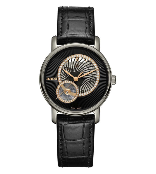 A black Rado DiaMaster Automatic Open Heart Diamonds watch with a mother-of-pearl dial, diamond accents, and a black leather strap.