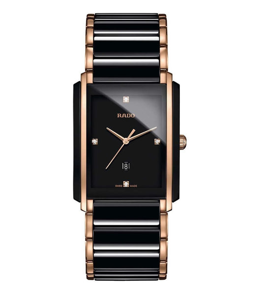 A RADO Integral Diamonds watch with a black ceramic band, rose gold stainless steel casing, and a black dial with diamond accents.