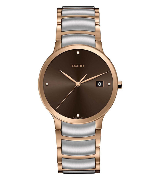 A Rado Centrix Diamonds watch for men with a brown dial, rose gold case, and silver bracelet.
