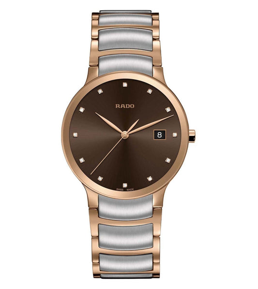 A RADO Centrix Diamonds watch for men featuring a brown dial with diamond accents, paired with a two-tone metallic bracelet in silver and gold colors.