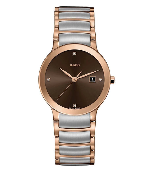 A Rado Centrix Diamonds watch for women with a brown dial, rose gold case, and silver bracelet.