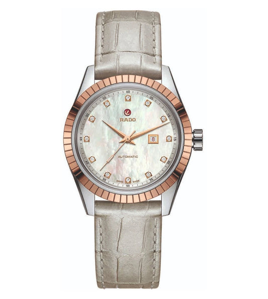 A Rado HyperChrome Classic Automatic watch for women with a white dial, rose gold case, and a gray leather strap.