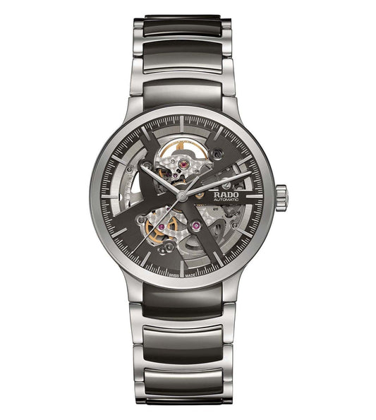 A Rado Centrix unisex watch with a silver bracelet and a black dial showcasing the automatic movement.