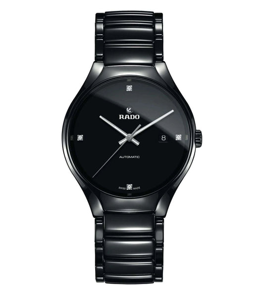 A black RADO True Automatic watch with a diamond-accented dial and a stainless steel bracelet.