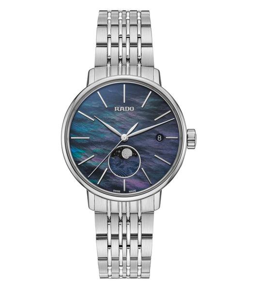 A silver Rado Coupole Classic analog watch for women with a blue dial and a stainless steel bracelet.