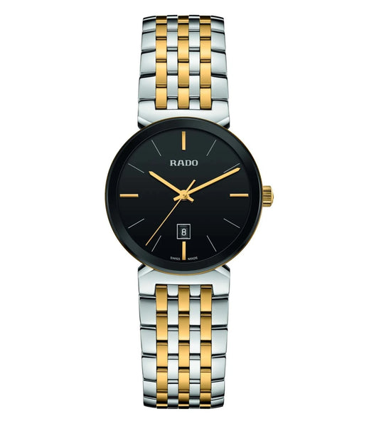 A Rado Florence Classic watch for women with a black dial, gold markers, and a two-tone gold and silver bracelet.