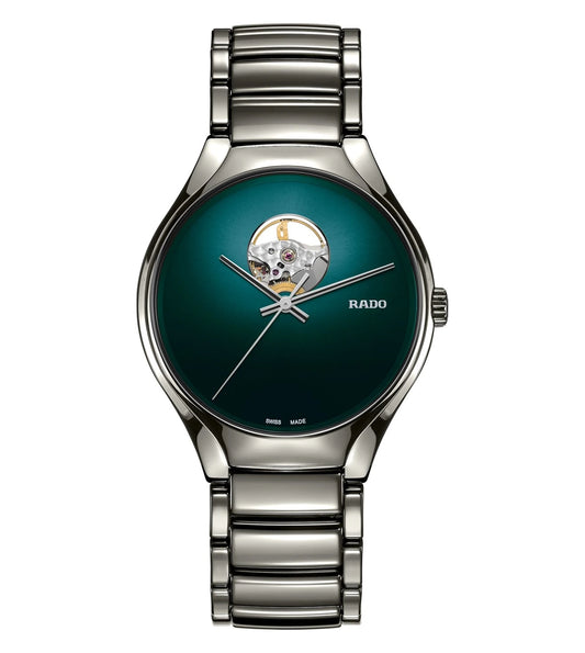 A Rado New True Analog Unisex Watch with a petrol blue dial and a metallic silver bracelet.