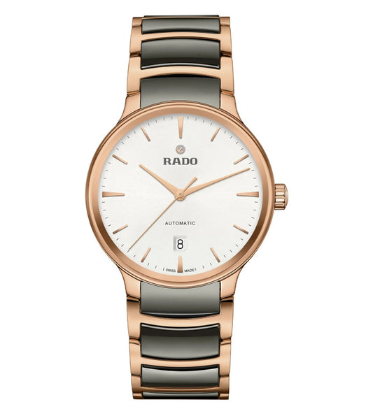 A Rado Centrix Automatic Unisex Watch with a silver sunray dial, rose-gold-coloured hands and applied indexes, and a two-tone bracelet with polished rose-gold-coated links.