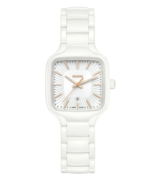 A white Rado True Square analog watch with a polished ceramic case, rose gold-colored hands, and a flat sapphire crystal dial.