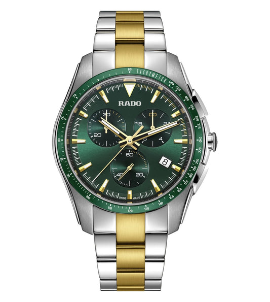 A Rado HyperChrome Chronograph watch with a green dial, yellow hands and indexes, and a two-tone bracelet with polished stainless steel and yellow brushed links.