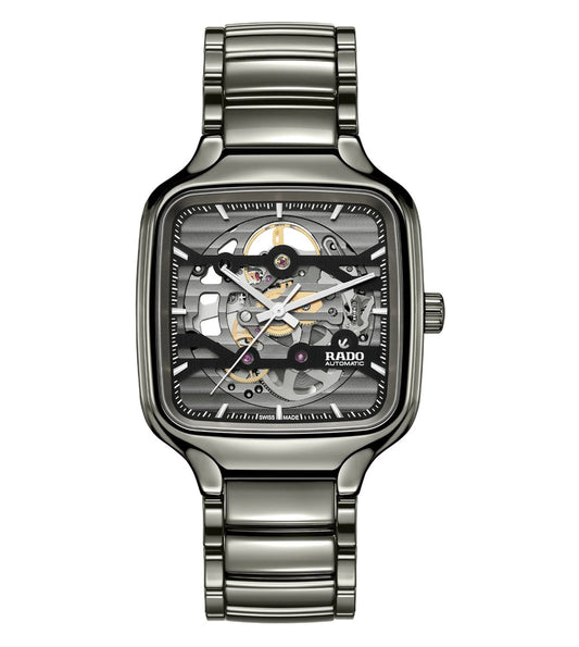 A Rado True Square Skeleton Automatic Unisex Watch with a silver-colored bracelet and a skeleton dial, showcasing the internal mechanism.