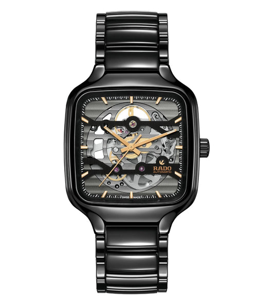 A black Rado True Square Skeleton automatic unisex watch with a skeleton dial and a black polished ceramic bracelet.