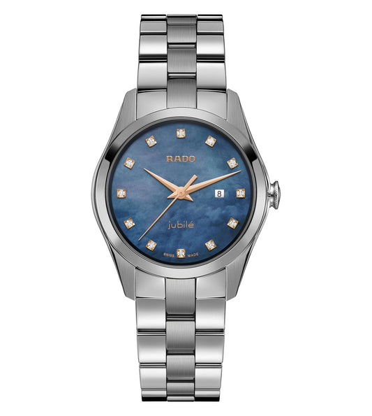 A Rado Hyperchrome analog watch for women with a blue mother-of-pearl dial, polished stainless steel bracelet, and gold-colored hands.