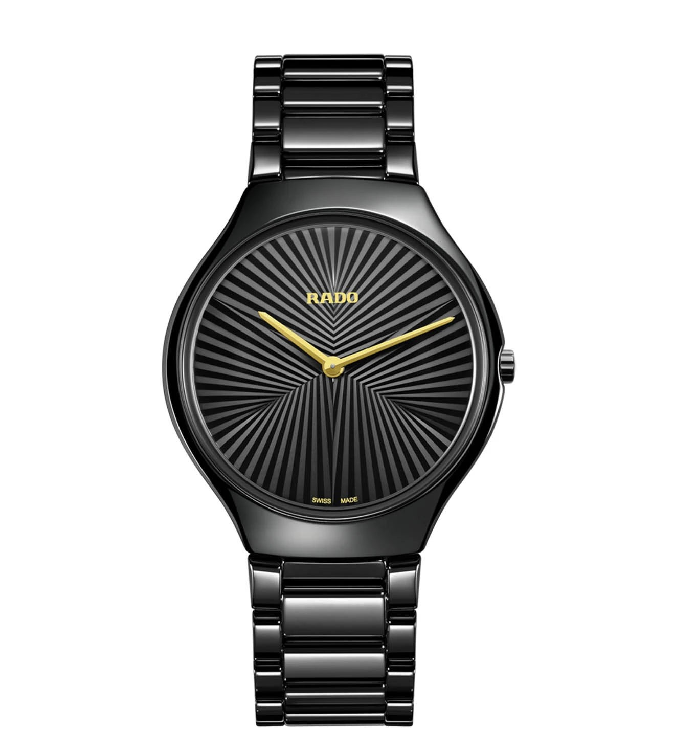 A black Rado True Thinline X Great Gardens of The World automatic unisex watch with a patterned dial and yellow gold colored hands.