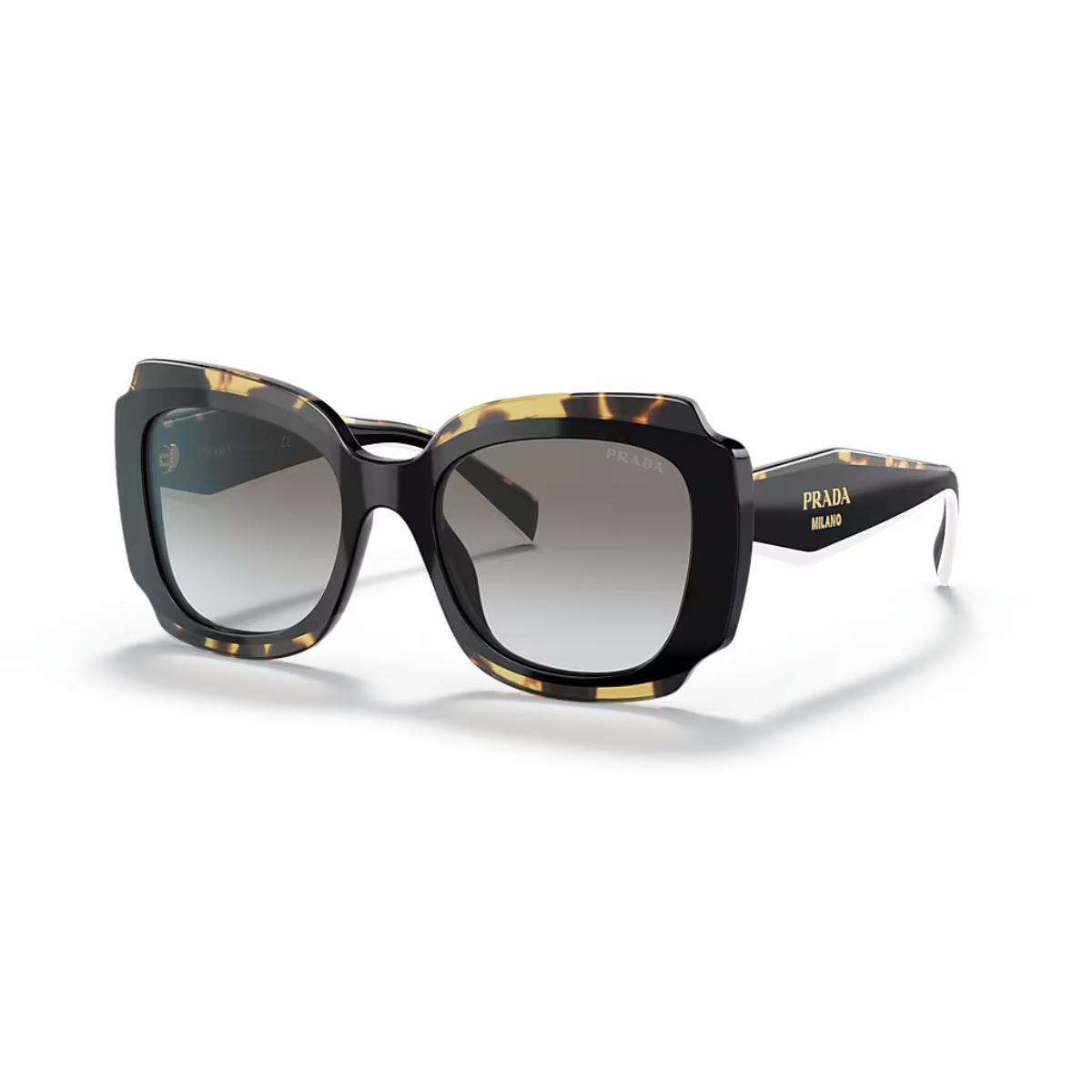 Black and tortoiseshell Prada sunglasses on a white background