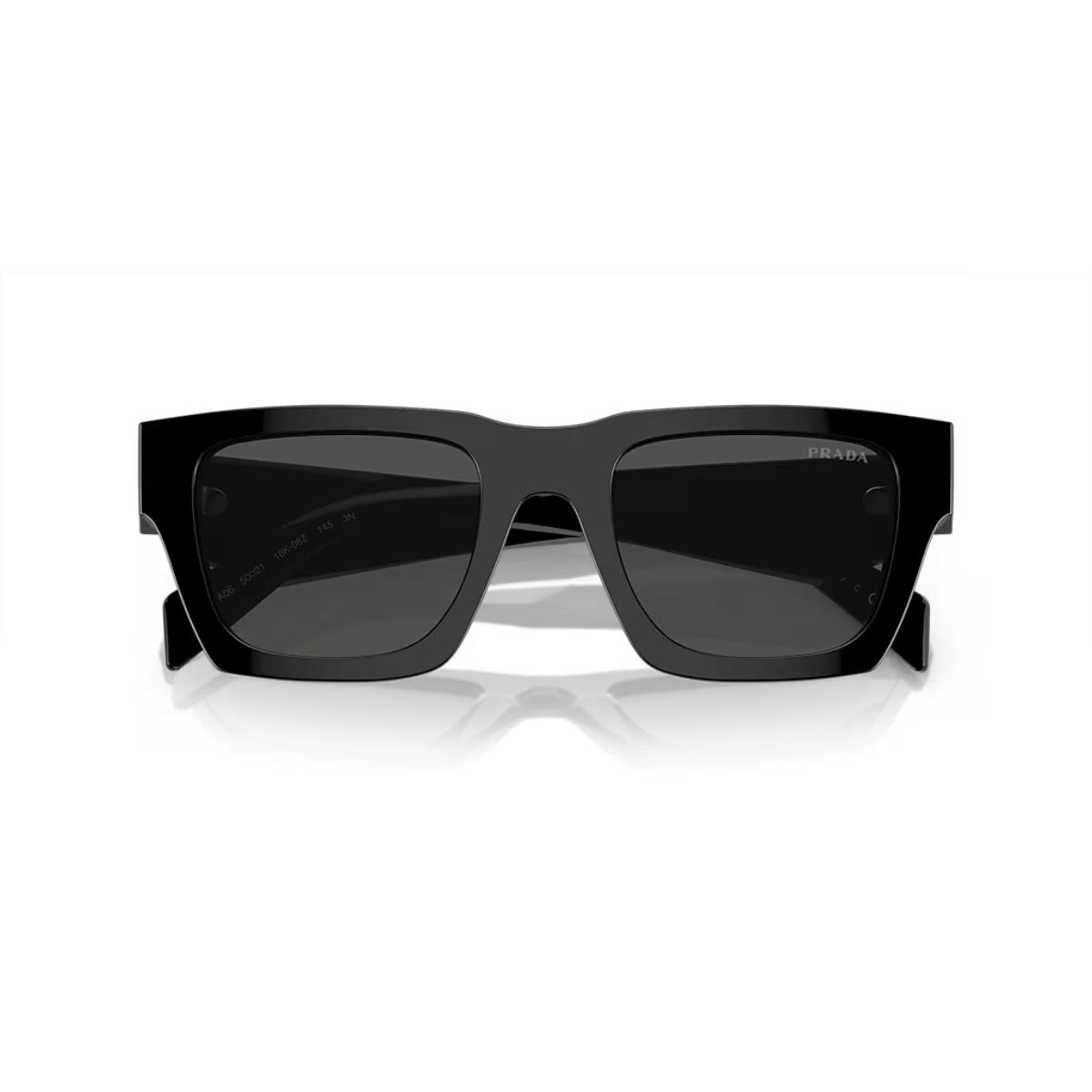 Black sunglasses with a reflective surface on a white background