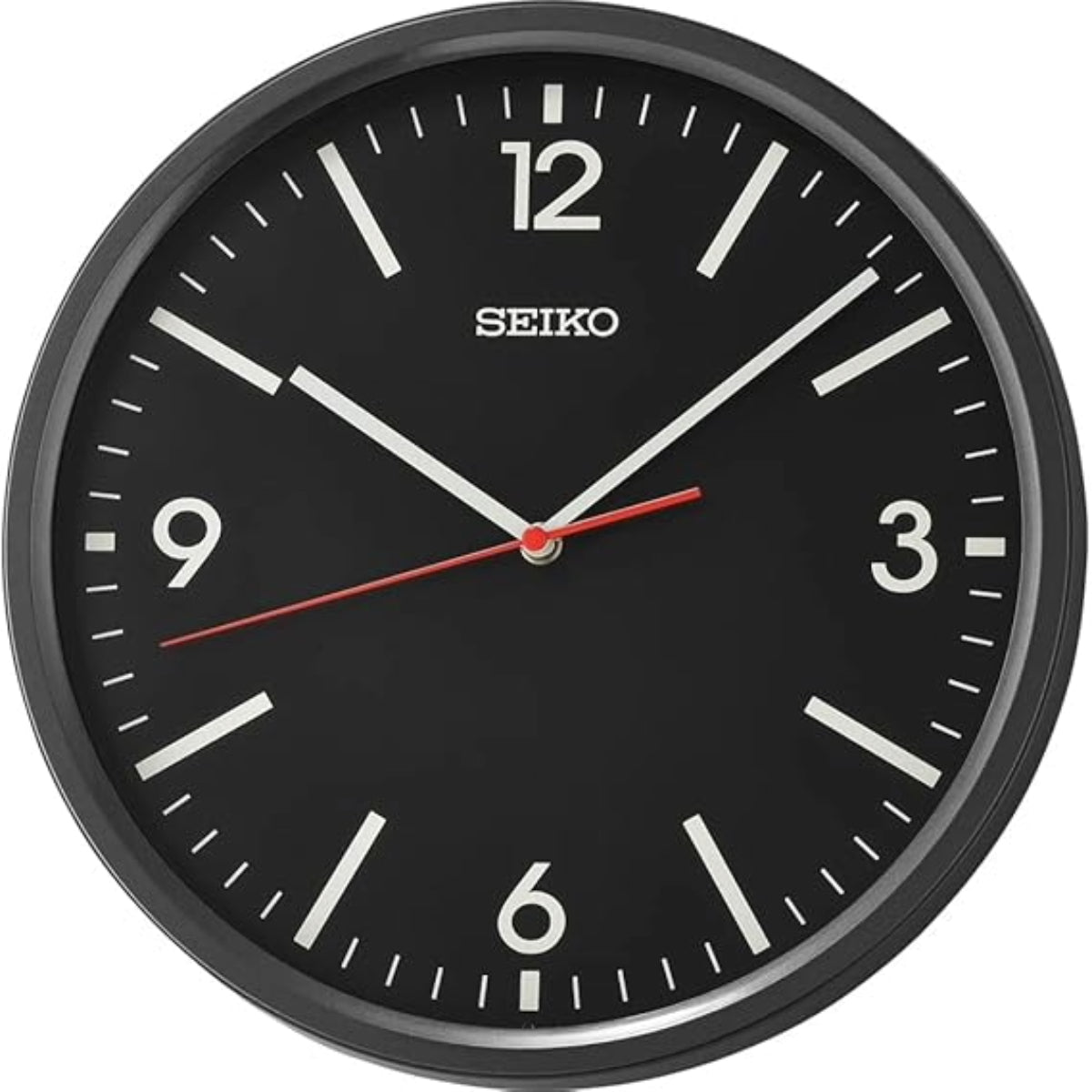 Seiko wall clock with black face and black frame on a white background