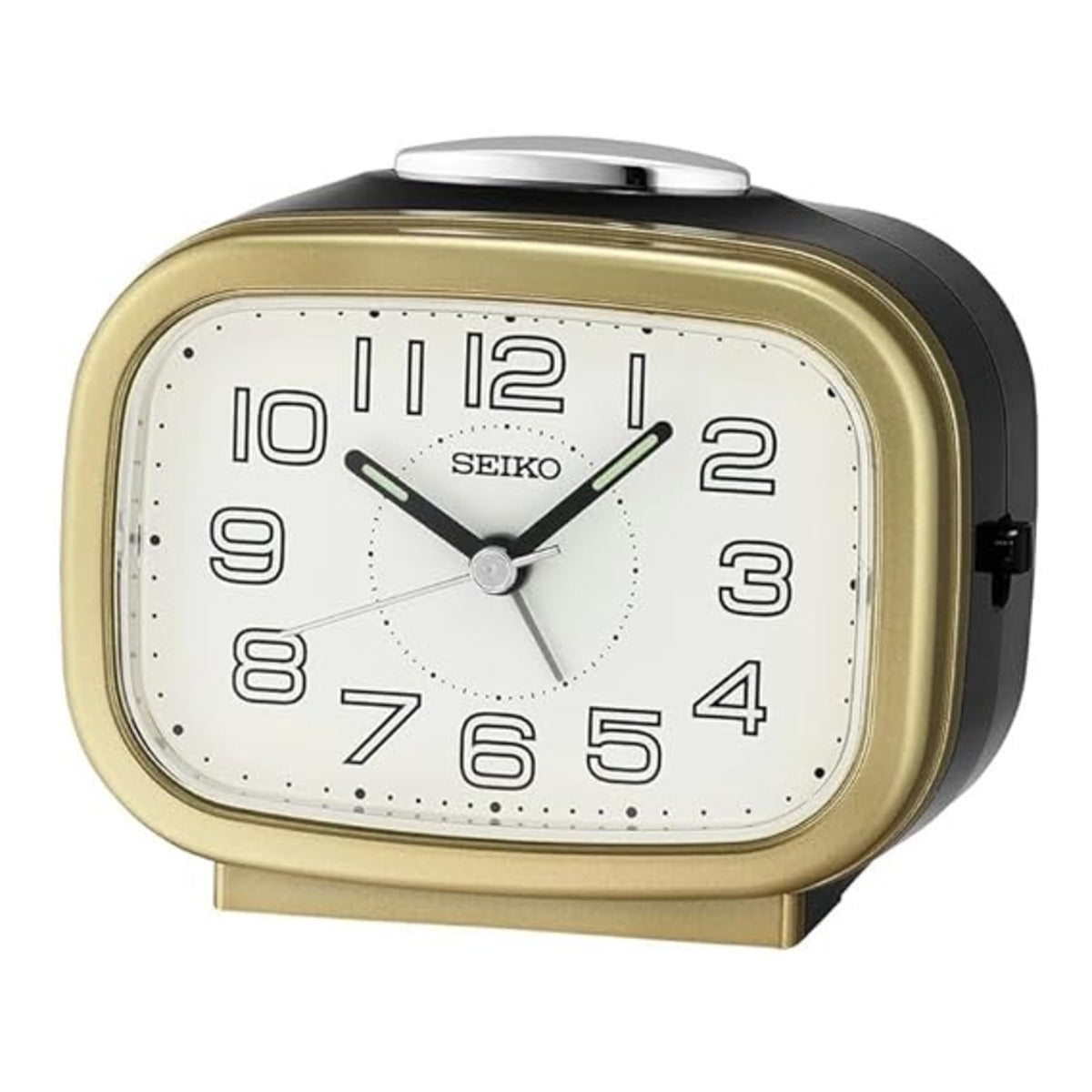 Seiko alarm clock with gold and black design on a white background