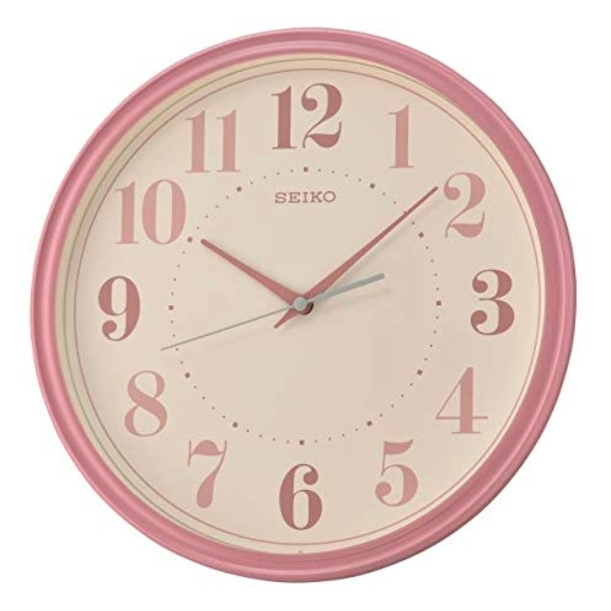 Pink Seiko wall clock on a white background