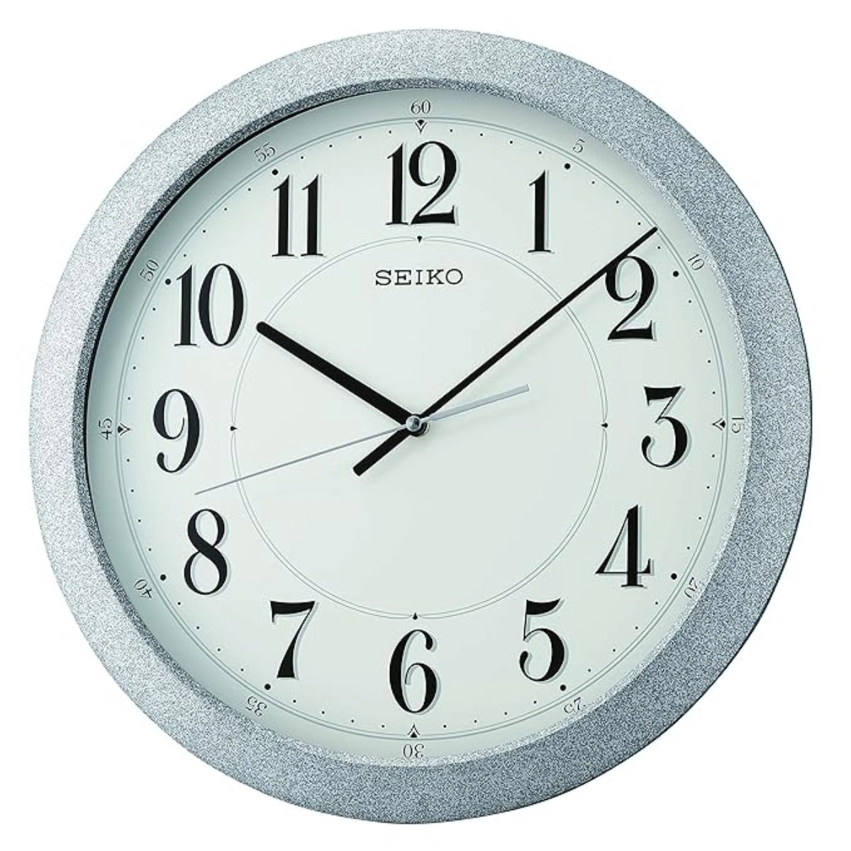 Seiko wall clock with silver glittery frame on a white background
