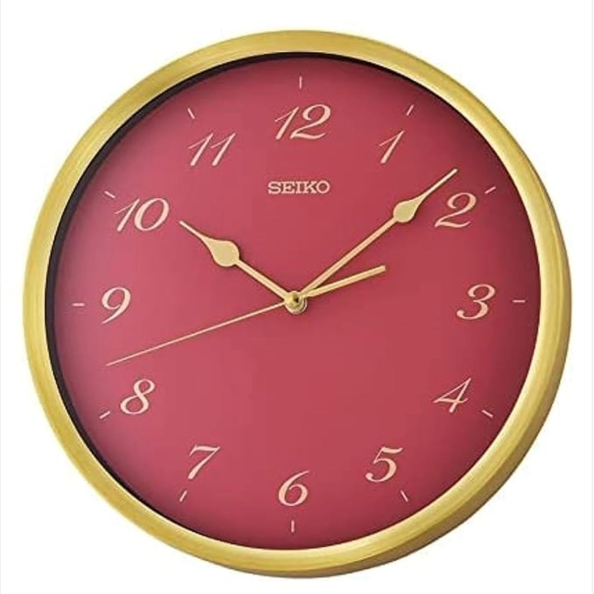 Seiko wall clock with red face and gold frame on a white background
