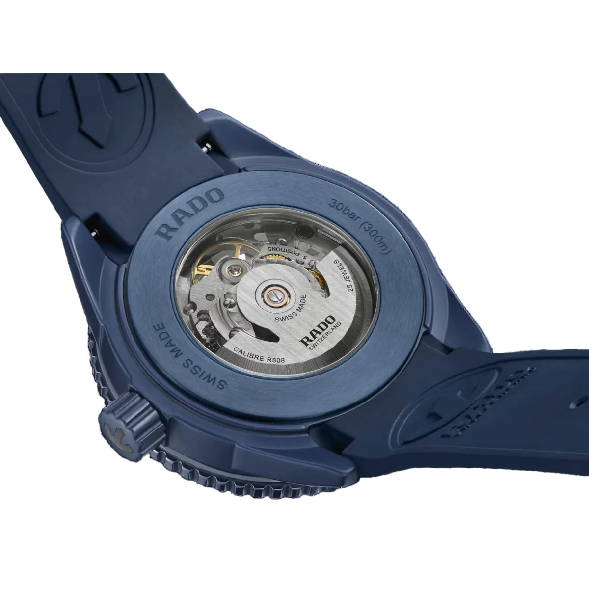 Blue Rado watch with open caseback on a black background